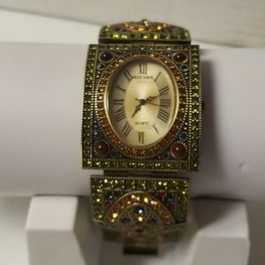 Heidi Daus vintage crystal & gold tone watch.